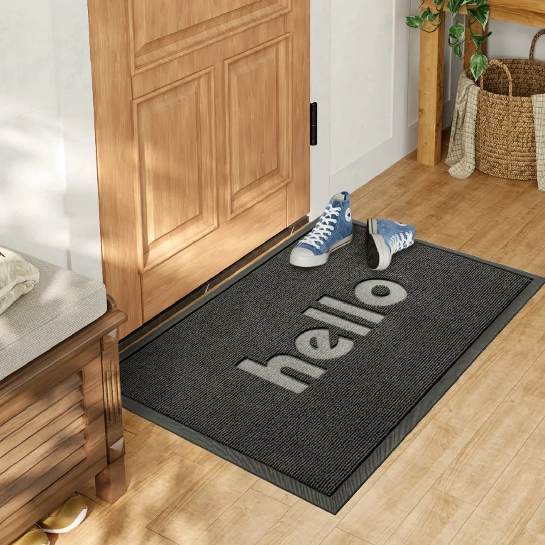 Premium-grade welcome mat strategically placed at hotel entrance for guest comfort and improved visual appeal